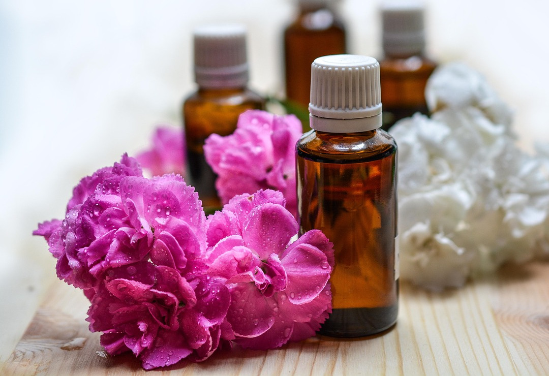 essential oil leaves spa flatlay